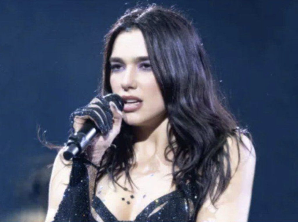 Dua Lipa Stuns in Sleek Black String Outfit